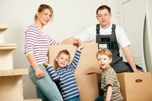 Customer moving storage items safely in a self storage facility