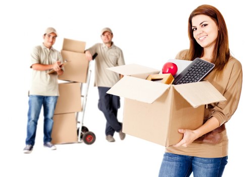 Boxes and household items organized in a storage space