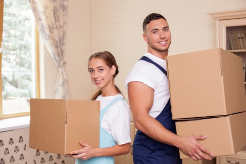 Professional office removals team handling desks and equipment in Catford