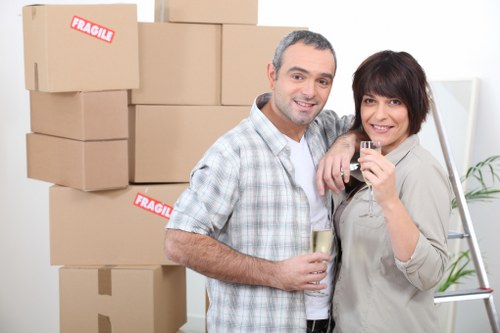 Professional movers loading furniture for removals in Catford