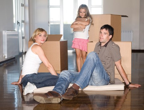 Mover handling items carefully during a Catford small removals job